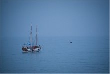 Lonely sailing vessel / *****