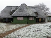 Cottage unter einem Strohdach / ***