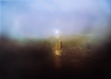 f o g / The fog comes
on little cat feet.
It sits looking
over harbor and city
on silent haunches
and then moves on.