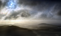 Connemara / Evening falling over the hills and mountains of Connemara in the west of Ireland