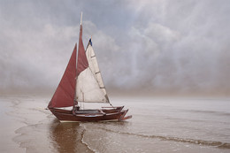 Angelandet / Ein Holzkatamaran an der holländischen Küste nahe Alkmaar.