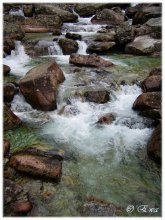 Am Wasserfall. / ***