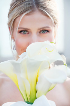 The eyes / Blue eyes hidden with a flower