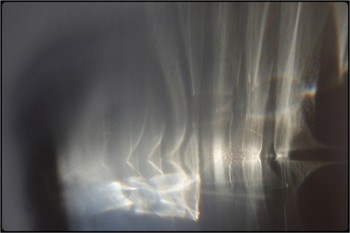 ghost in a bottle (3) / light refraction through water bottle