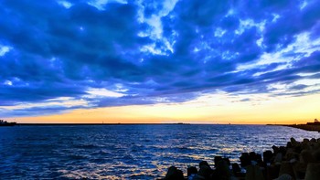 In the sunset. / ***