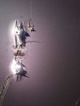 Between a hat and a body / In between