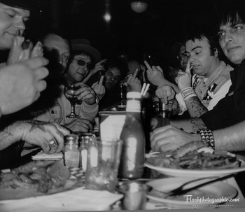  / Founding punk group Slaughter and the dogs played Maxwell's club and bar Hoboken New Jersey 2002 film was shot in 122 nanometer infrared through filter 35 mm film Canon A1 50 mm lens. Seated while eating dinner with the opening group that supported them on the tour from Portland Oregon the riffs.