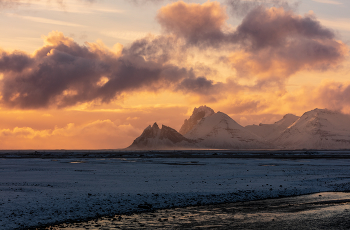 Stokksness headland sunset on Iceland / Stokksnes headland winter sunset on the southeastern Icelandic coast, near Hofn and Hornafjoerdur. including Vestrahorn mountain.