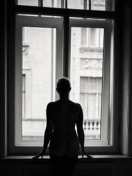 Near the window / ***