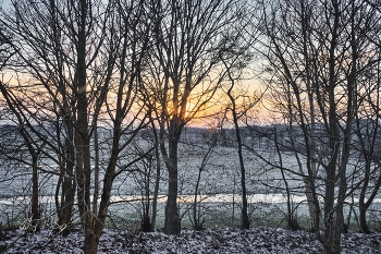 Der Morgen erwacht / Sonnenaufgang im Schnee und Eis