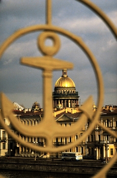 Saint Petersburg / Saint Petersburg is located on the Neva River, at the head of the Gulf of Finland; the easternmost arm of the Baltic.
On a photo walk in Russia's second largest city I chose to frame the golden dome of Saint Isaac's Cathedral within an anchor; to emphasize Saint Petersburg's connection with the sea.
Founded by Peter the Great in 1703, Saint Petersburg became the imperial capital of Russia until 1918. The Baltic port was also known as Petrograd in 1914, then Leningrad in 1924, before reverting back to Saint Petersburg in 1991.
https://travelnotes.org/pics/Europe/14-Saint_Petersburg_Russia.htm