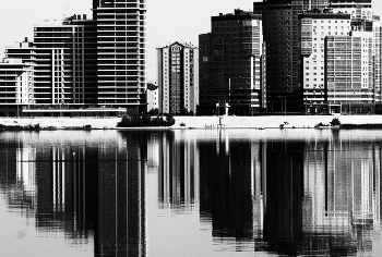 City / ***