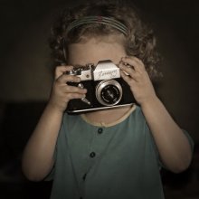 Fotograf bei der Arbeit / ***