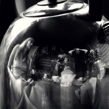 Group portrait in a teapot with a teapot in the center of the composition / ***