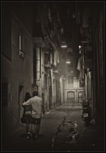 Two men in dark city / ***