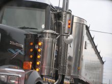 In the side view mirror / ***