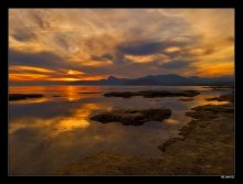 Sunset in the bay Kapsel / ***