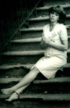 On the stairs. / ***