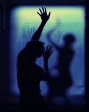 At the window. / _________