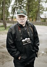 Portrait photographer. / ***