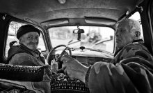 In a retro car / ........