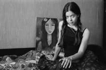 portrait of a girl in the room with the picture / ***