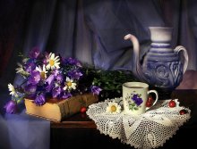 With the blue pitcher / ***