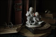 on the bookshelf / ***