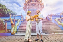 Newlyweds after a Buddhist ceremony in the temple. / Newlyweds after a Buddhist ceremony in the temple.