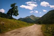 On the road with clouds / ***