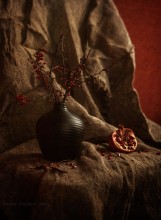 Still life with pomegranate. / ***
