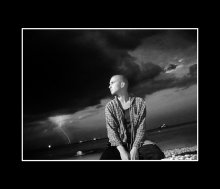 man and lightning / 12345