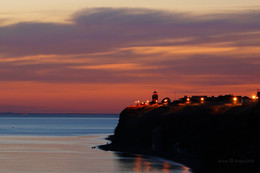 Leuchtturm nach Sonnenuntergang / ***