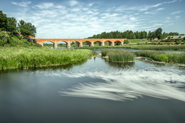 Near the bridge / ***