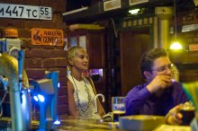 at the bar. / ***