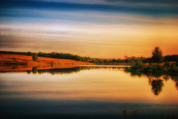At the river. / ***