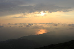 Between heaven and earth. / ***