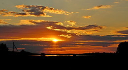 die Sonne in den Wolken / ***