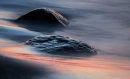 two in red / stones after sunset
