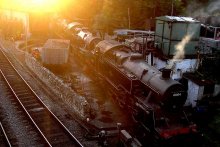 Sunset in the locomotive depot of the city Svonedzha / ***