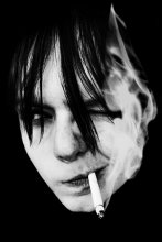 "Portrait of a man smoking" / ***
