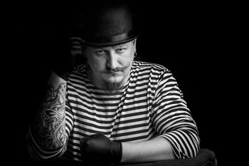 man in a hat / man, hat, background, hipster, guy, music, summer, isolated, happy, young, fedora, red, black, listening, handsome, male, singing, adult, caucasian, portrait, people, wearing, looking, boy, men