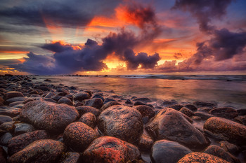 Sunset sky, the magnificent clouds in last beams of the sun / Sunset on Baltic Sea