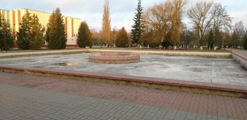 At the fountain / ***