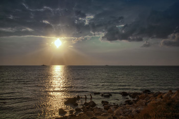 At sunset / ***