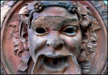 faunus / closeup of fountain-head - detail of antique sculpture