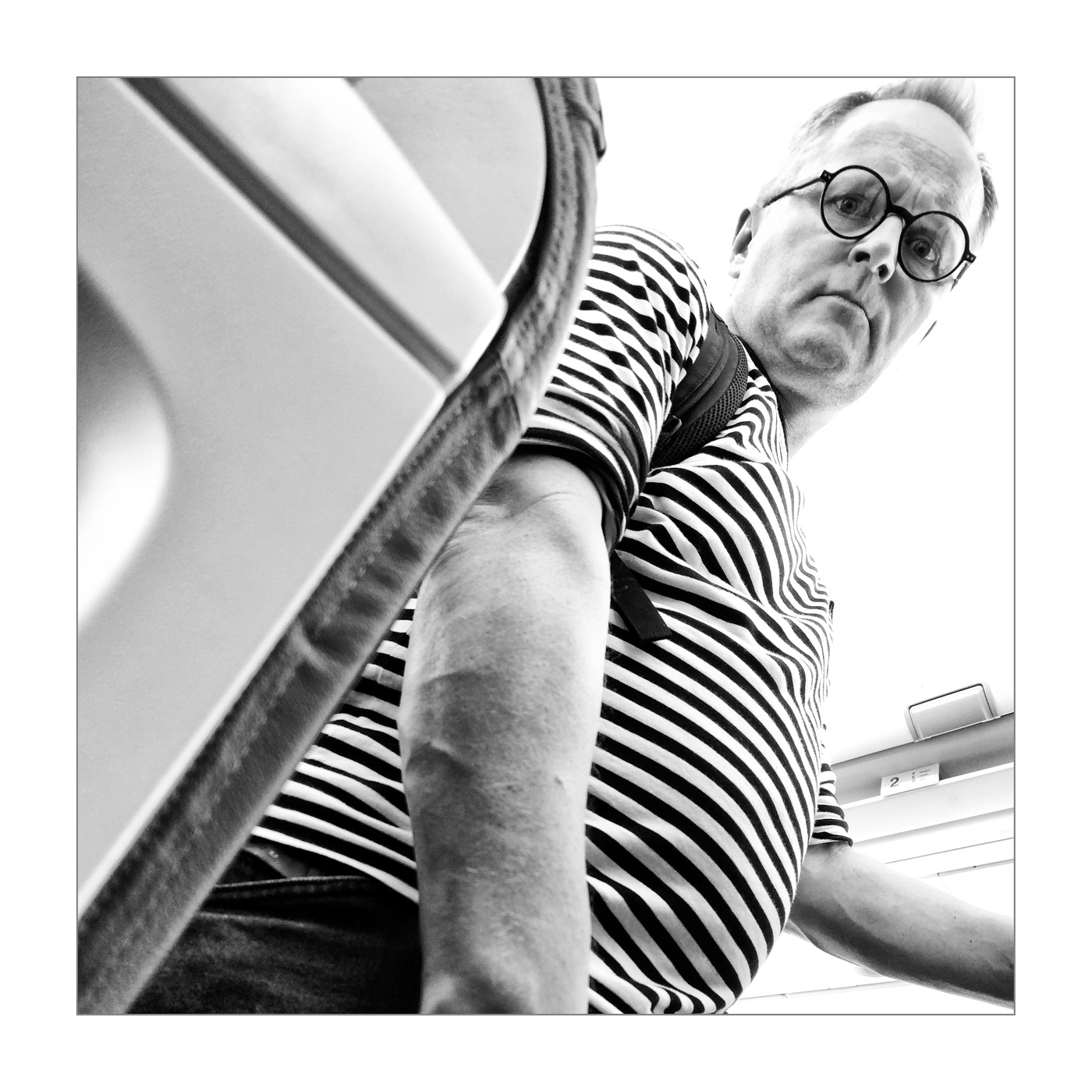 Из кресла самолета