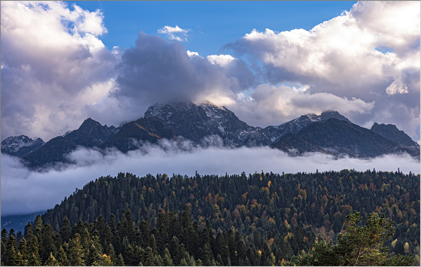 Меж облаков