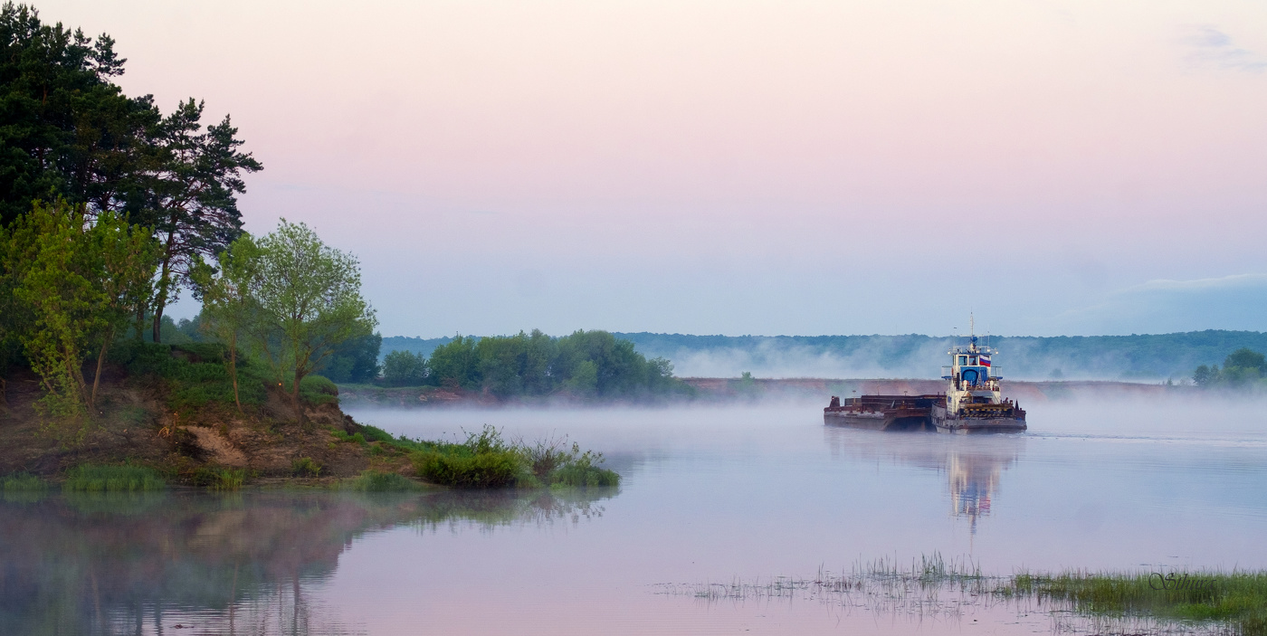 По течению.