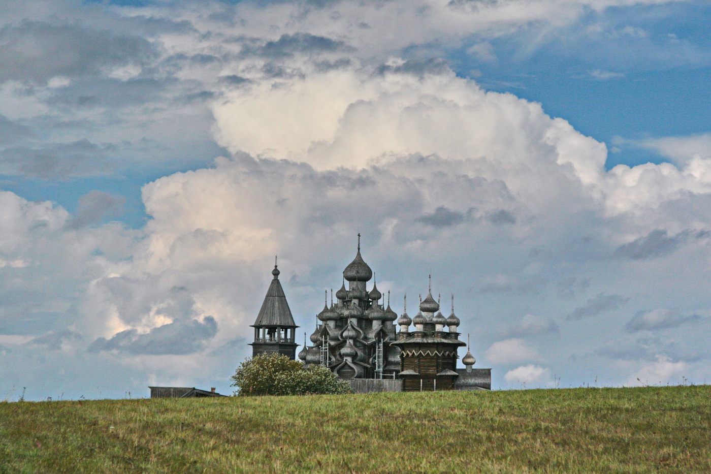 Из-под горки...